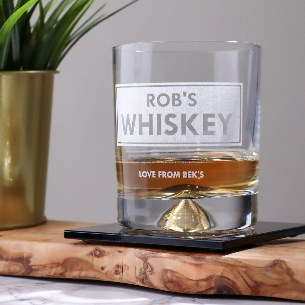 a personalised whiskey tumbler with heavy base and detailing, professionally engraved
