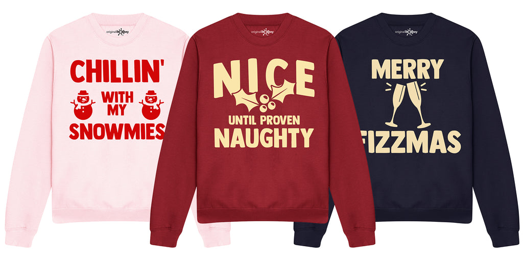 3 Christmas jumpers with new bold designs ready for Chrsitmas 2021, one says chilling with my snomies, the other one says merry fizzmas and the last one says nice until proven naughty 