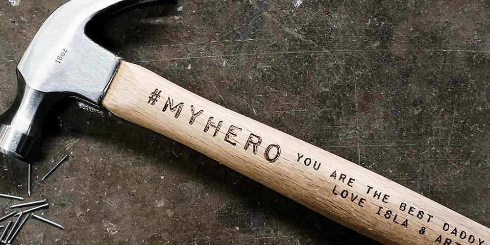 a personalised hammer with My hero engraved and a personal message creating the perfect gift for Dad