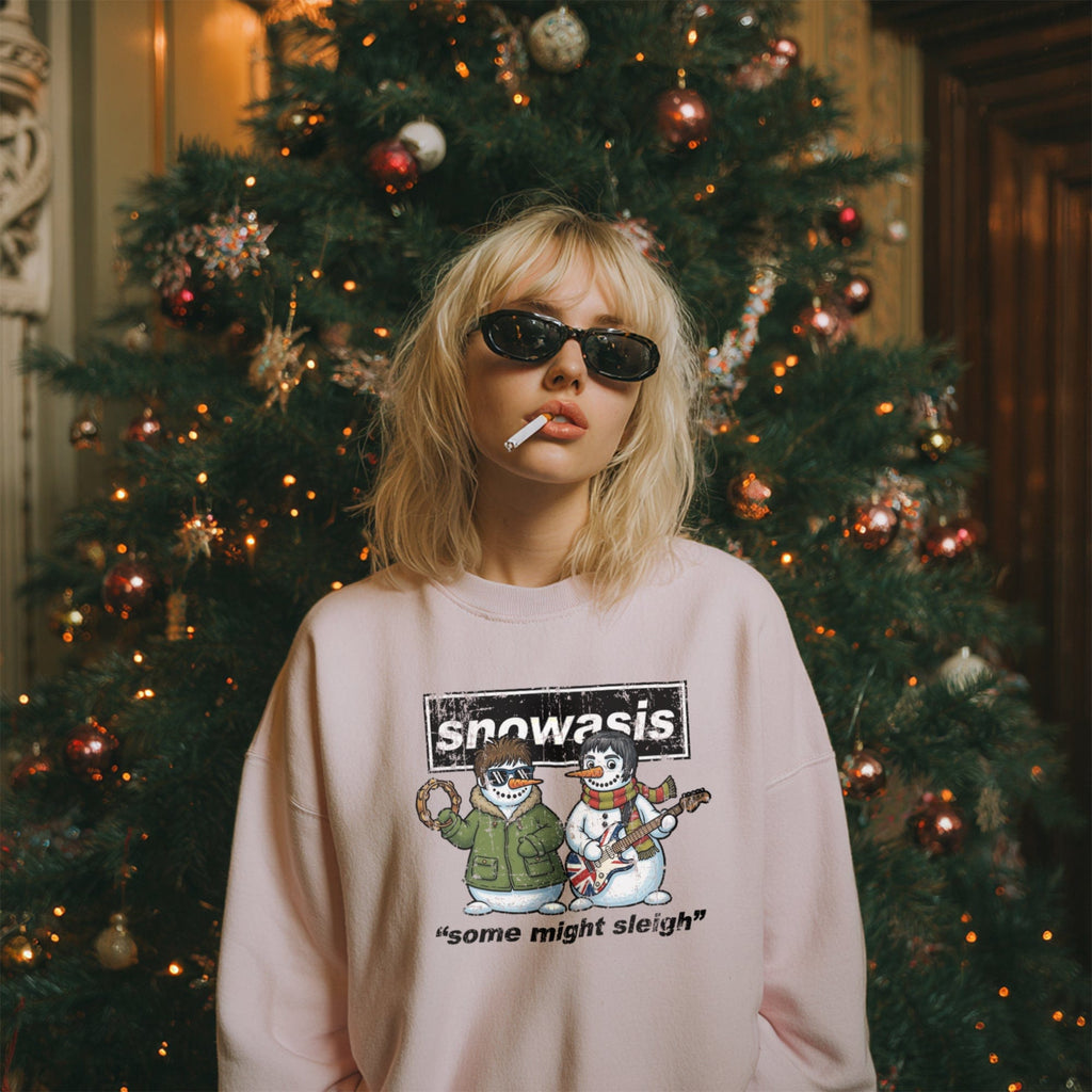Funny Oasis-inspired “Snowasis” Christmas jumper featuring a festive snowman design with Britpop vibes. Perfect novelty sweatshirt for music fans and Xmas gifts.