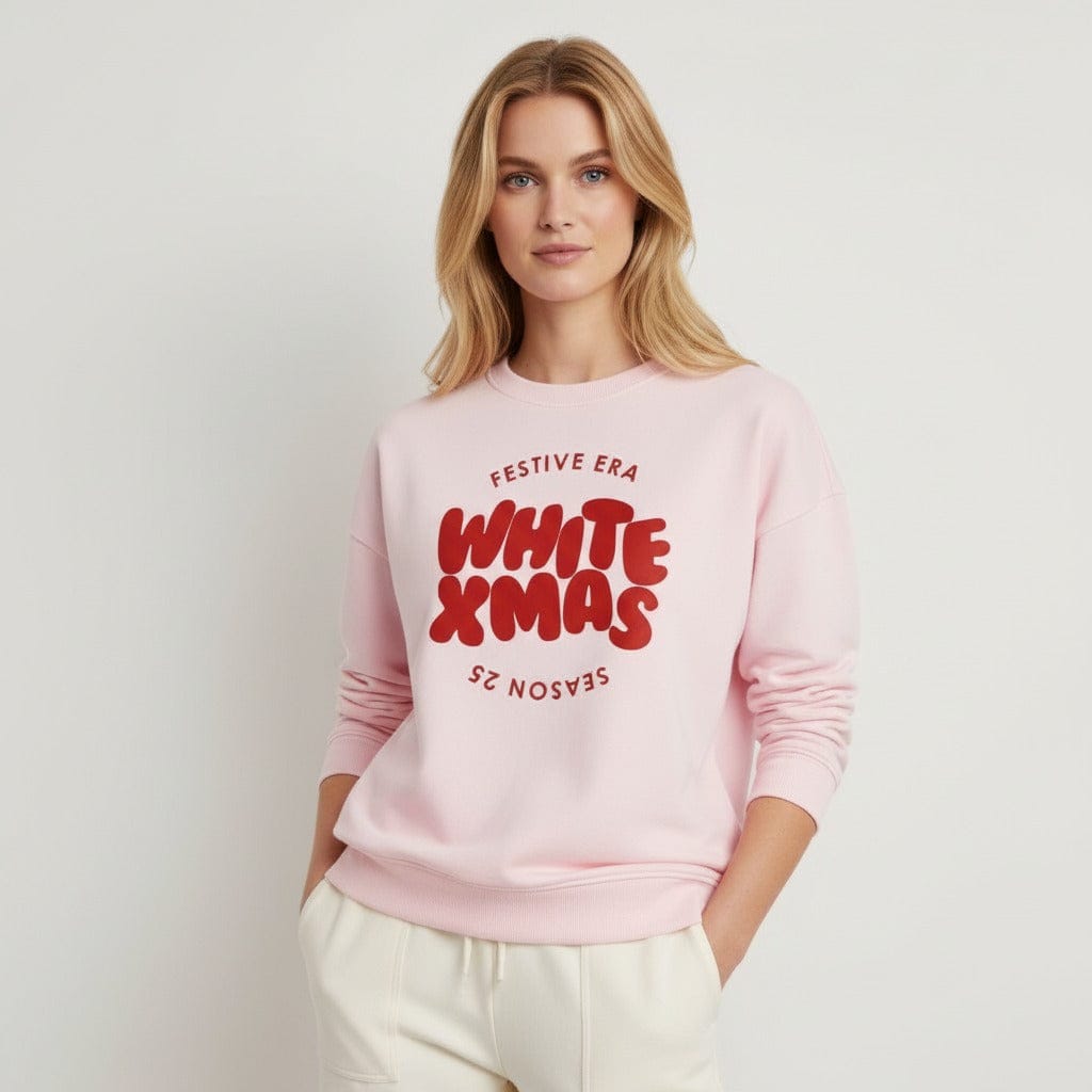 women wearing a pink festive era christmas jumper by handford and mason