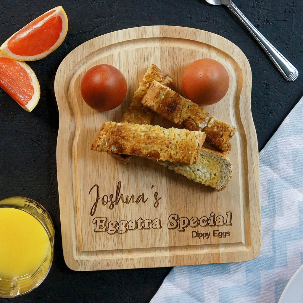 Wooden egg breakfast board with eggstra special personalisation by Original Monkey Gifts.