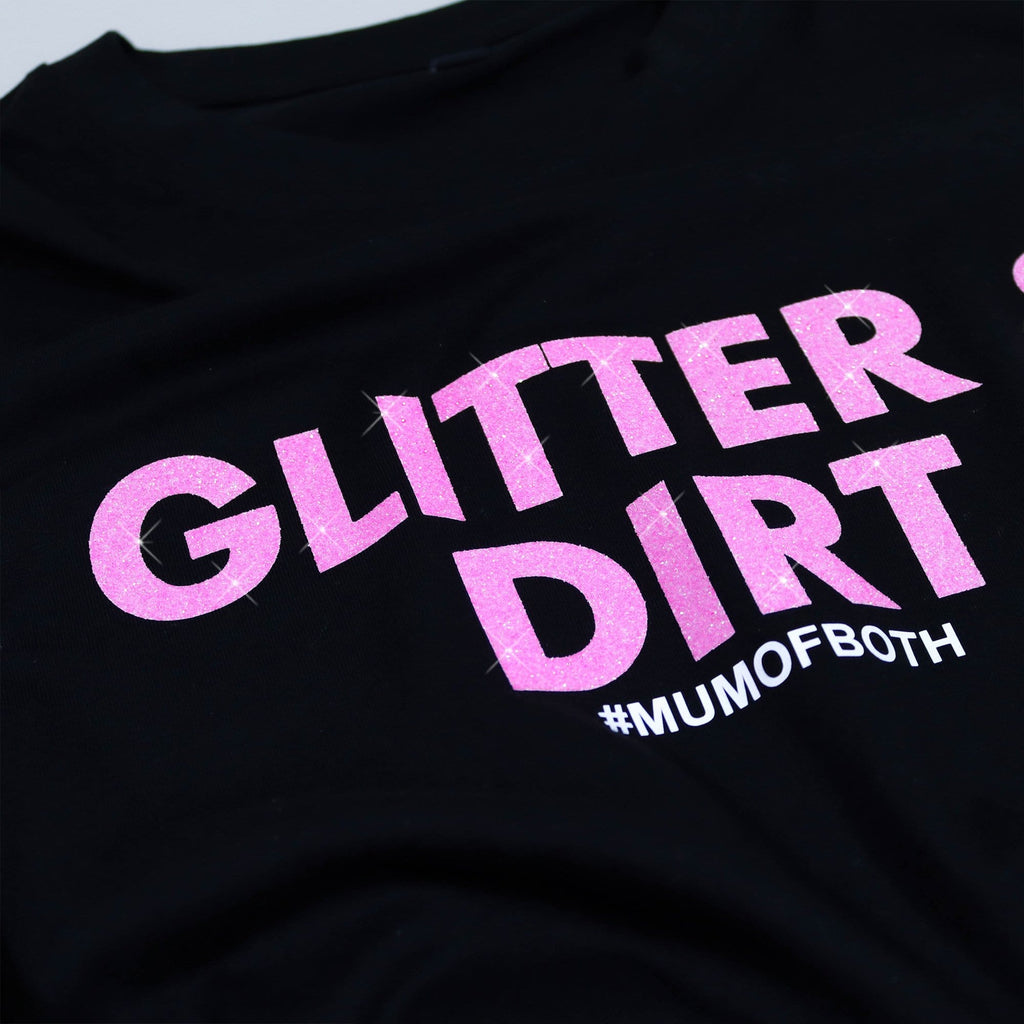 Black T shirt lay flat with pink glittery text reading 'glitter and dirt #mum of both' by Original Monkey Gifts.