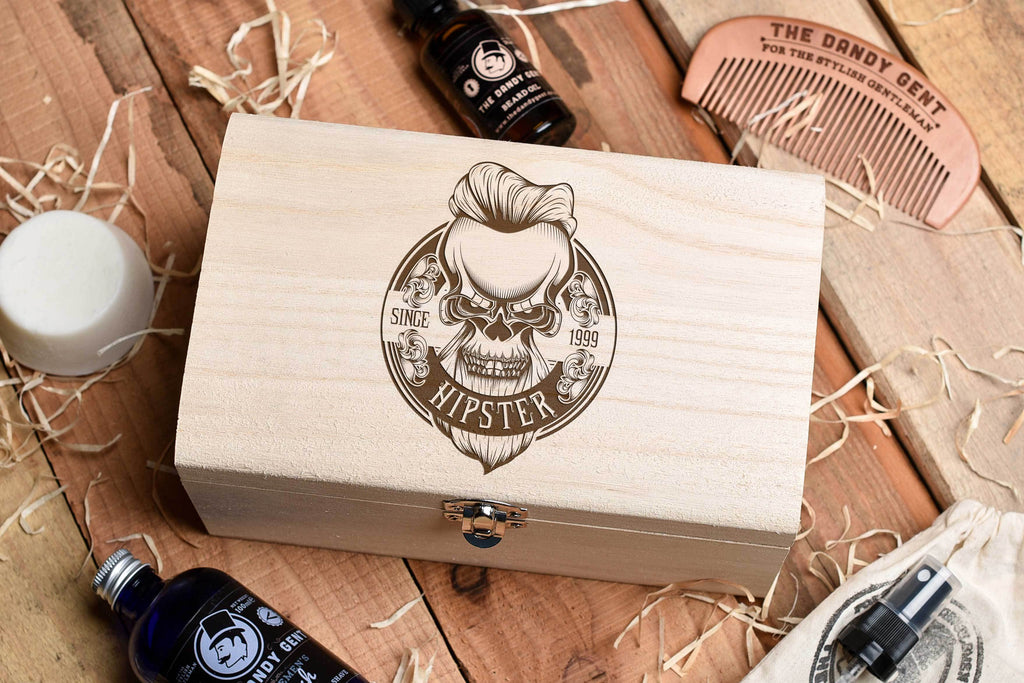 Wooden box on a wooden table top with engraved skull and personalised engraving by Original Monkey Gifts.