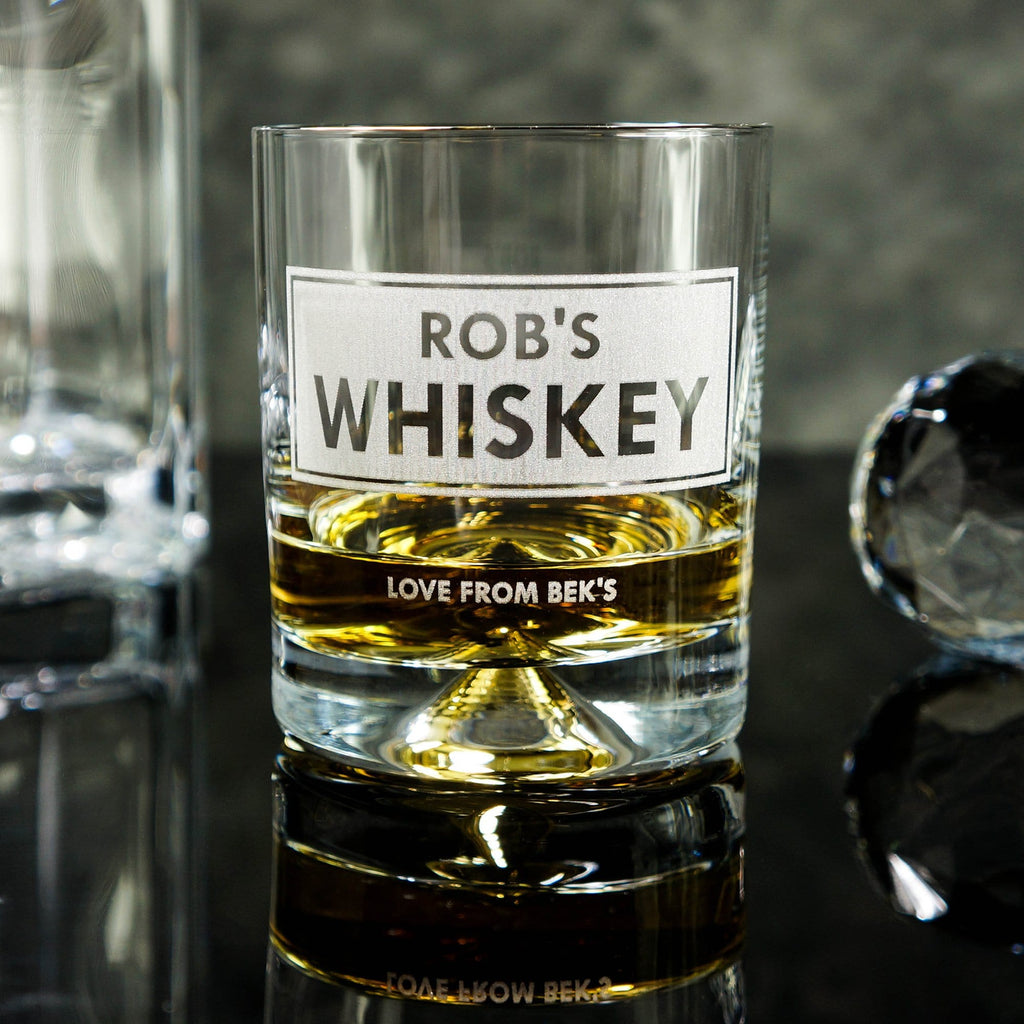 a personalised whiskey tumbler with heavy base and detailing, professionally engraved