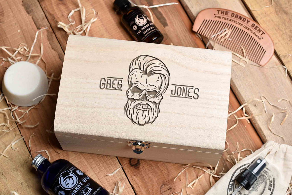 Wooden box on a wooden table top with engraved skull and personalised engraving by Original Monkey Gifts.