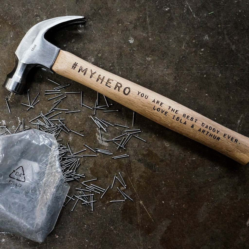Wooden hammer with personalised engraving that reads 'my hero' by Original Monkey Gifts.