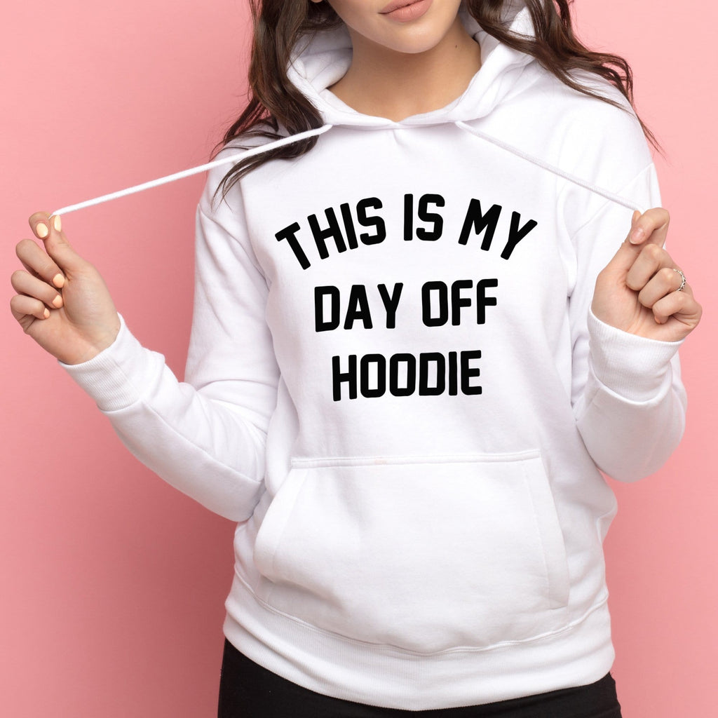 woman wearing white hoodie with This is my Day off Hoodie in black text made by Original Monkey