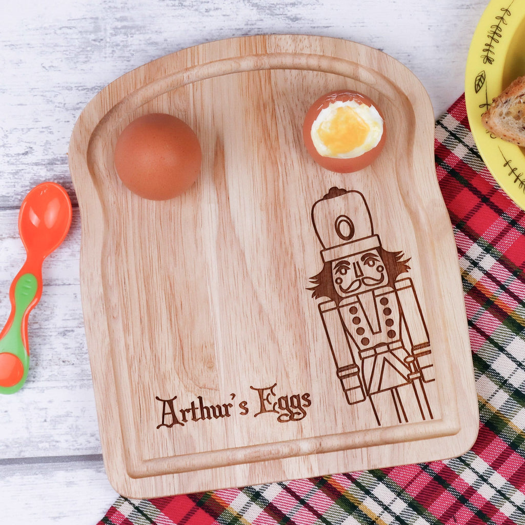 Egg breakfast board with personalised engraving and nutcracker figure by Original Monkey Gifts.