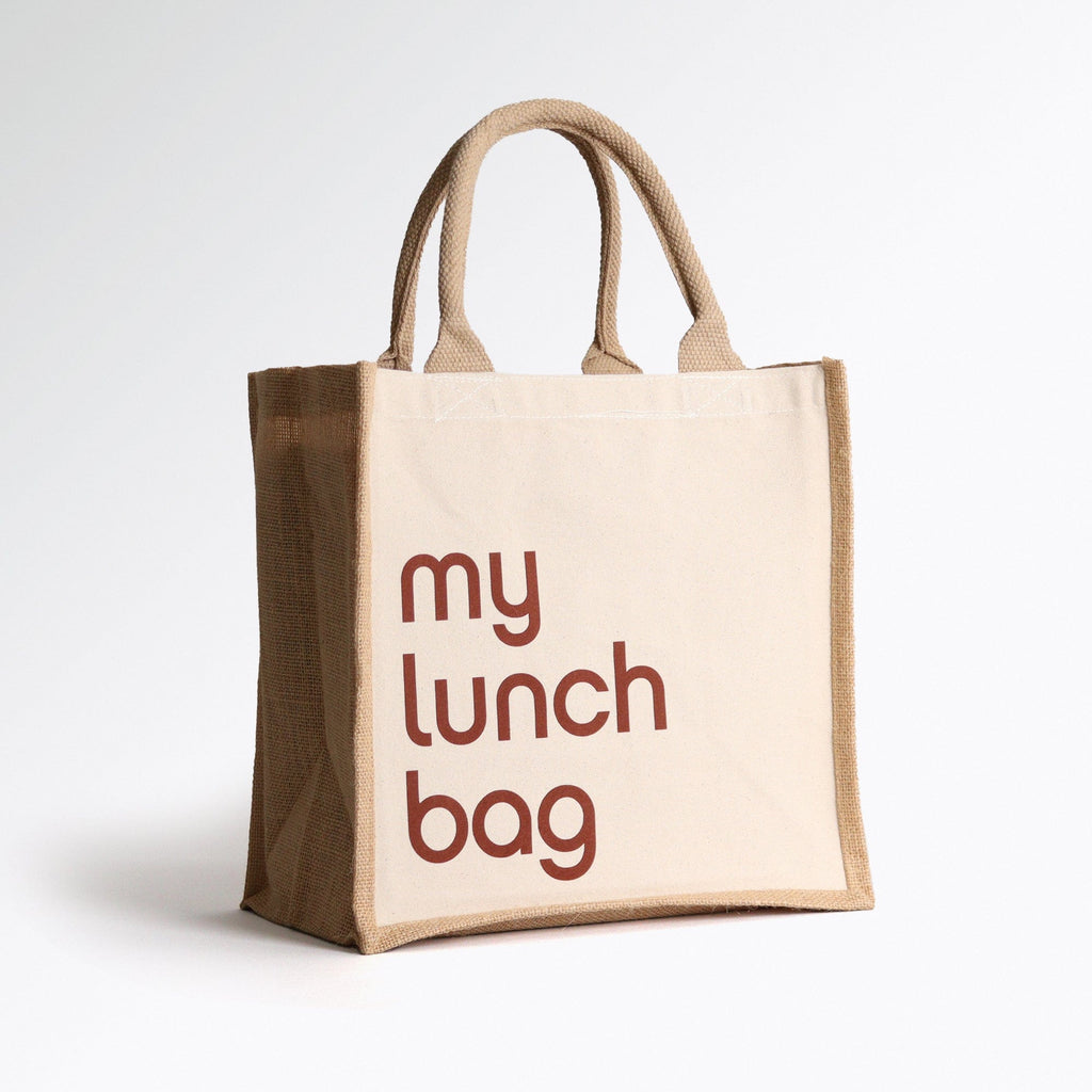 a cute natural coloured tote bag with the wording my lunch bag on the front in a striking yet fun font