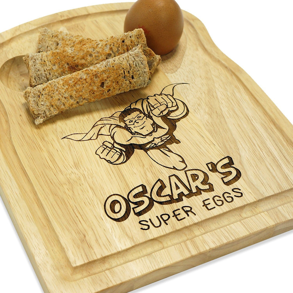 Wooden egg breakfast board with superhero personalisation by Original Monkey Gifts.