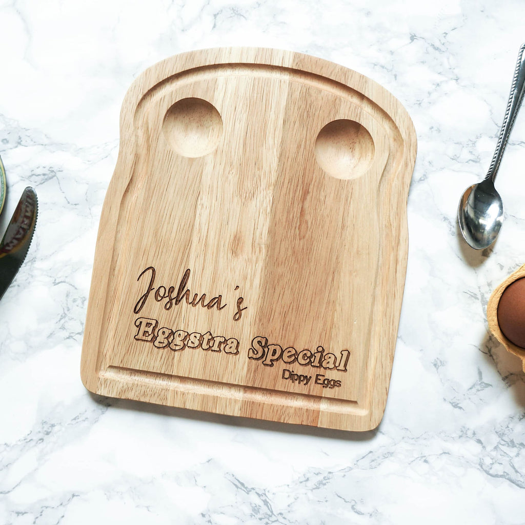 Wooden egg breakfast board with eggstra special personalisation by Original Monkey Gifts.