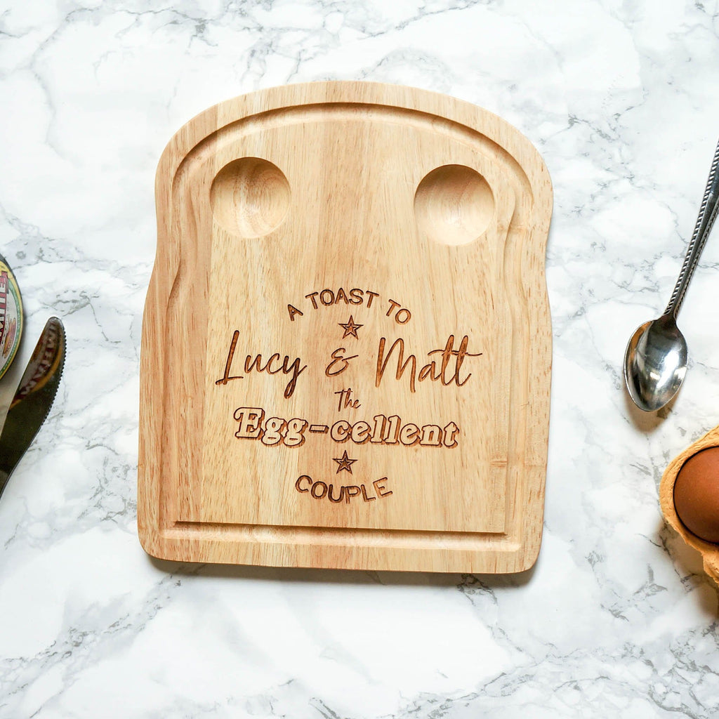 Wooden egg breakfast board with couple personalisation by Original Monkey Gifts.