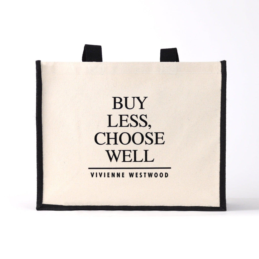 a black and natural tote ag with famous designer quote "Buy less, Choose well"