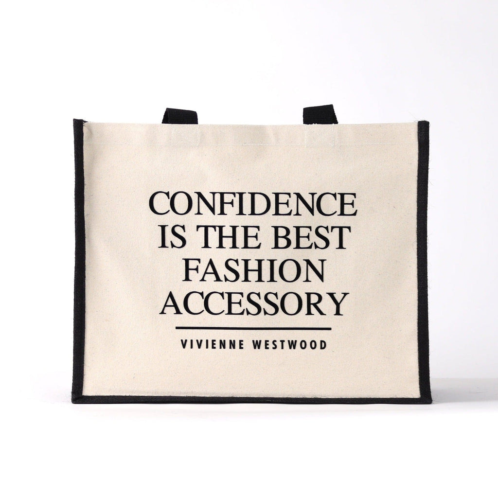 a black and natural tote bag with a famous quote from a fashion designer "confidence is the best accessory"