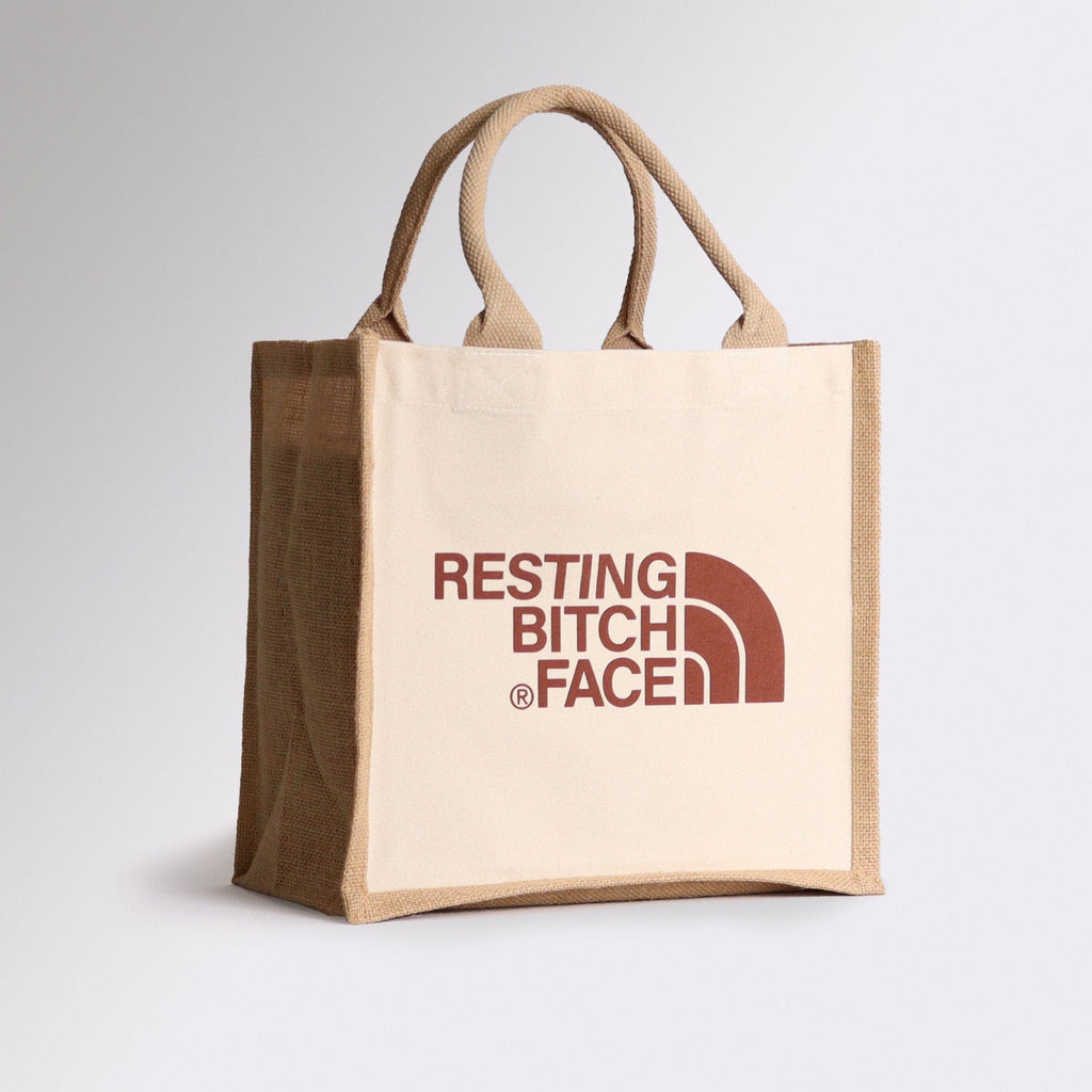 the perfect tote bag for lunch it is a natural coloured tote bag with a brown font saying resting bitch face great gift idea