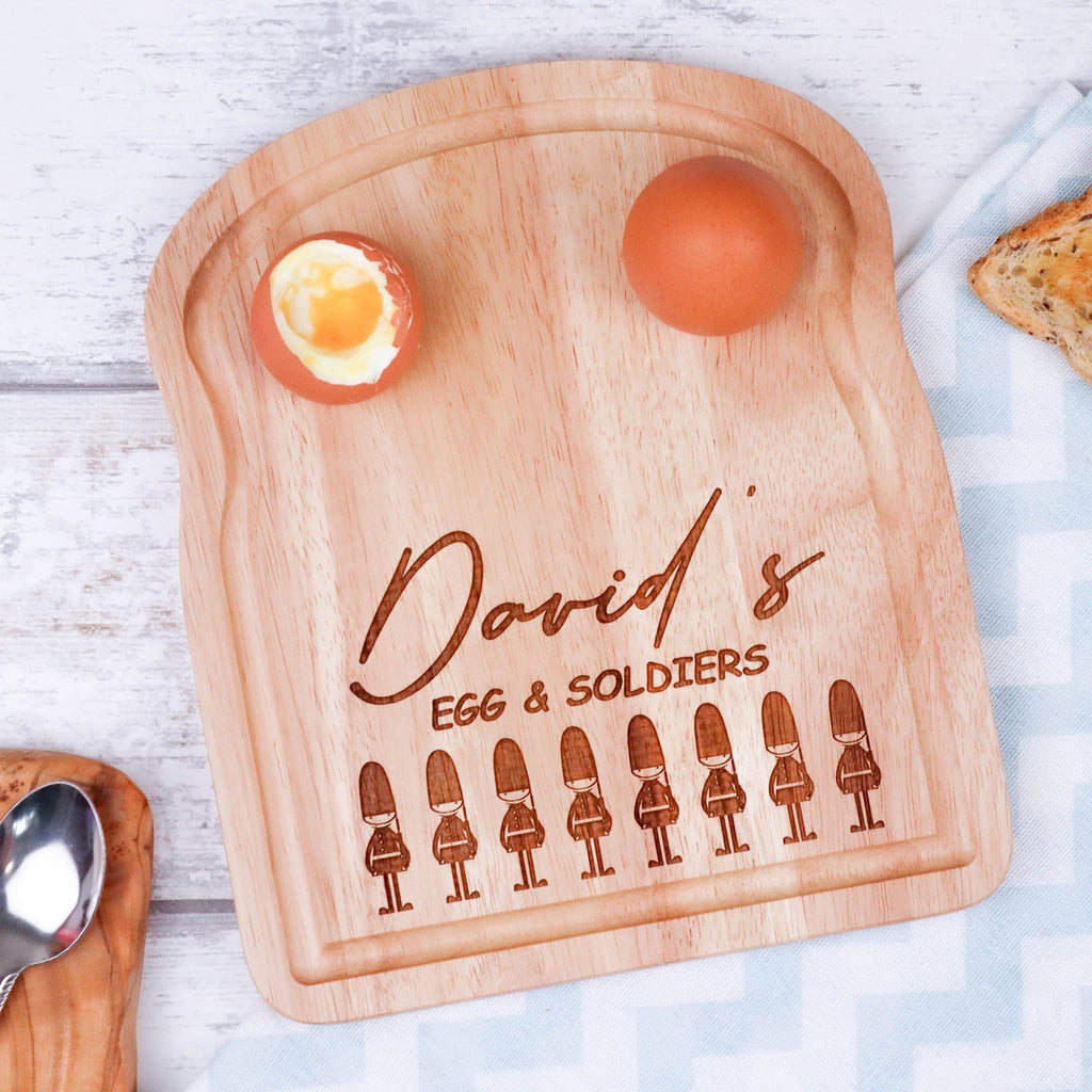 Wooden egg breakfast board with personalisation and soldiers image by Original Monkey Gifts.